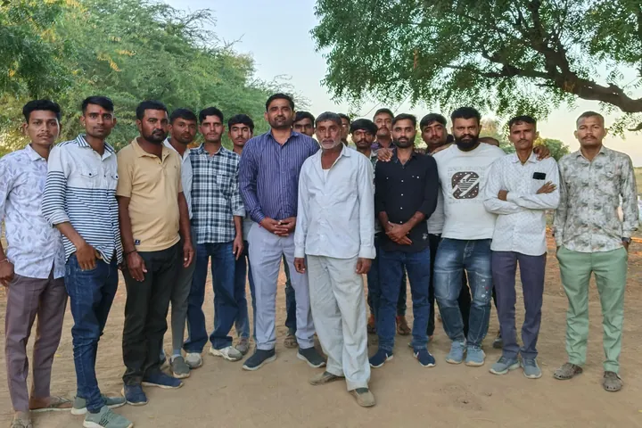 Ekta team with farmers on a farm visit.